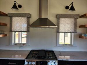 Custom roller shades in a new Kitchen